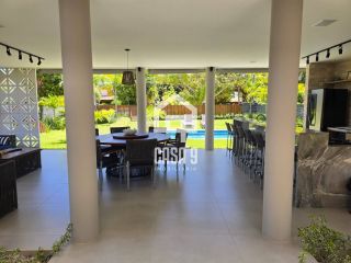 Casa térrea mobiliada com 5 suítes a venda no condomínio Enseada Praia da Espera em Itacimirim Bahia