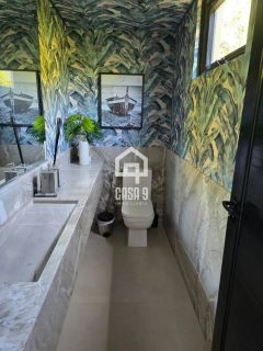 Casa térrea mobiliada com 5 suítes a venda no condomínio Enseada Praia da Espera em Itacimirim Bahia