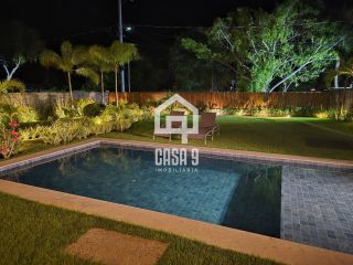 Casa térrea mobiliada com 5 suítes a venda no condomínio Enseada Praia da Espera em Itacimirim Bahia