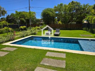 Casa térrea mobiliada com 5 suítes a venda no condomínio Enseada Praia da Espera em Itacimirim Bahia