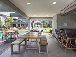 Apartamento térreo duplex com 2 suítes a venda no condomínio Bali Exclusive em Itacimirim Bahia