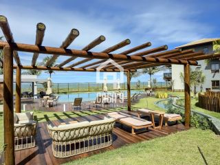 Apartamento térreo duplex com 2 suítes a venda no condomínio Bali Exclusive em Itacimirim Bahia