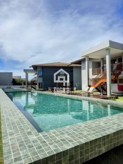 Apartamento térreo duplex com 2 suítes a venda no condomínio Bali Exclusive em Itacimirim Bahia