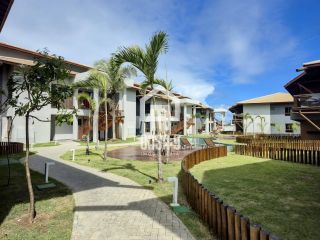 Apartamento térreo duplex com 2 suítes a venda no condomínio Bali Exclusive em Itacimirim Bahia