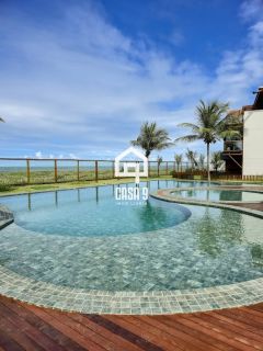 Apartamento mobiliado térreo com 3 suítes frontal mar a venda no condomínio Bali Exclusive em Itacimirim Bahia