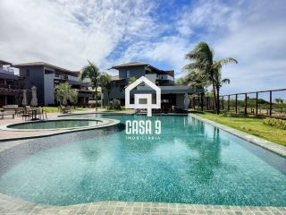Apartamento mobiliado térreo com 3 suítes frontal mar a venda no condomínio Bali Exclusive em Itacimirim Bahia