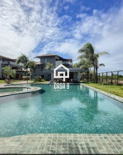Apartamento mobiliado térreo com 3 suítes frontal mar a venda no condomínio Bali Exclusive em Itacimirim Bahia