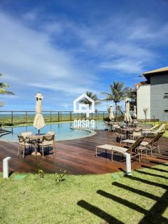 Apartamento mobiliado térreo com 3 suítes frontal mar a venda no condomínio Bali Exclusive em Itacimirim Bahia