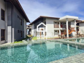 Apartamento mobiliado térreo com 3 suítes frontal mar a venda no condomínio Bali Exclusive em Itacimirim Bahia