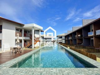 Apartamento mobiliado térreo com 3 suítes frontal mar a venda no condomínio Bali Exclusive em Itacimirim Bahia