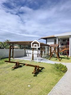 Apartamento mobiliado térreo com 3 suítes frontal mar a venda no condomínio Bali Exclusive em Itacimirim Bahia