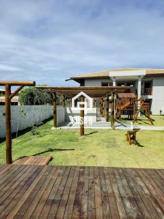 Apartamento mobiliado térreo com 3 suítes frontal mar a venda no condomínio Bali Exclusive em Itacimirim Bahia
