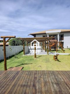 Apartamento mobiliado térreo com 3 suítes frontal mar a venda no condomínio Bali Exclusive em Itacimirim Bahia
