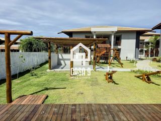 Apartamento mobiliado térreo com 3 suítes frontal mar a venda no condomínio Bali Exclusive em Itacimirim Bahia