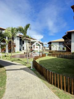 Apartamento mobiliado térreo com 3 suítes frontal mar a venda no condomínio Bali Exclusive em Itacimirim Bahia