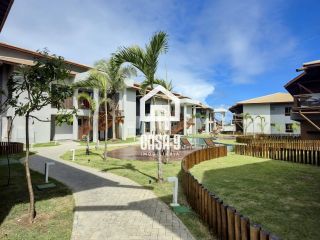 Apartamento mobiliado térreo com 3 suítes frontal mar a venda no condomínio Bali Exclusive em Itacimirim Bahia