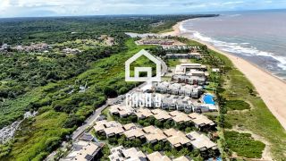 Apartamento mobiliado térreo com 3 suítes frontal mar a venda no condomínio Bali Exclusive em Itacimirim Bahia