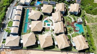 Apartamento mobiliado térreo com 3 suítes frontal mar a venda no condomínio Bali Exclusive em Itacimirim Bahia