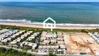 Apartamento mobiliado térreo com 3 suítes frontal mar a venda no condomínio Bali Exclusive em Itacimirim Bahia