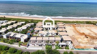 Apartamento mobiliado térreo com 3 suítes frontal mar a venda no condomínio Bali Exclusive em Itacimirim Bahia
