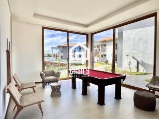 Apartamento mobiliado térreo com 3 suítes frontal mar a venda no condomínio Bali Exclusive em Itacimirim Bahia