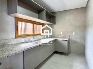 Apartamento mobiliado térreo com 3 suítes frontal mar a venda no condomínio Bali Exclusive em Itacimirim Bahia