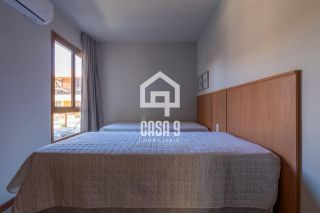 Apartamento mobiliado térreo com 3 suítes frontal mar a venda no condomínio Bali Exclusive em Itacimirim Bahia