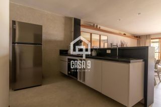 Apartamento mobiliado térreo com 3 suítes frontal mar a venda no condomínio Bali Exclusive em Itacimirim Bahia