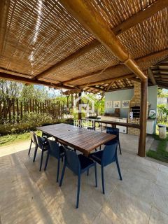 Apartamento térreo nascente mobiliado com 3 suítes a venda no condomínio Vila 7 Mares em Itacimirim Bahia