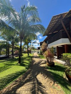 Apartamento térreo nascente mobiliado com 3 suítes a venda no condomínio Vila 7 Mares em Itacimirim Bahia