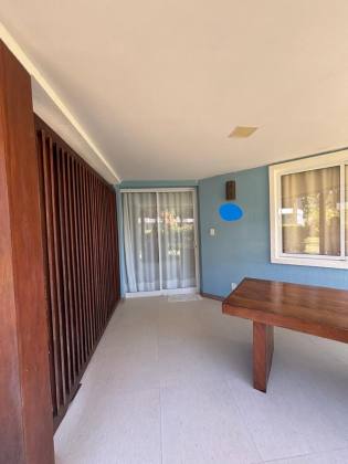 Apartamento térreo nascente mobiliado com 3 suítes a venda no condomínio Vila 7 Mares em Itacimirim Bahia