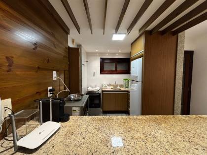 Apartamento térreo nascente mobiliado com 2 suites a venda no condomínio TERRACES PORTO DAS BALEIAS em Praia do Forte Bahia