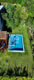 Exclusiva Casa de Alto Padrão na Praia do Forte – 5 Suítes, Piscina e Renda Imediata