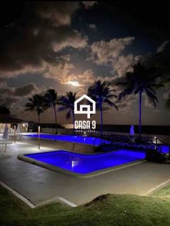 Apartamento duplex nascente com 3 suítes pé na areia e mobiliado a venda em Itacimirim Bahia