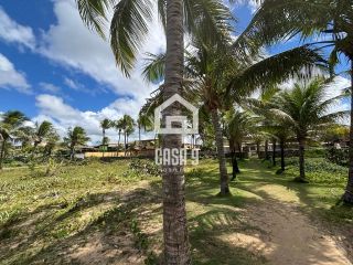 Apartamento duplex nascente com 3 suítes pé na areia e mobiliado a venda em Itacimirim Bahia