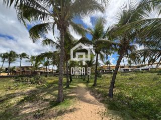 Apartamento duplex nascente com 3 suítes pé na areia e mobiliado a venda em Itacimirim Bahia