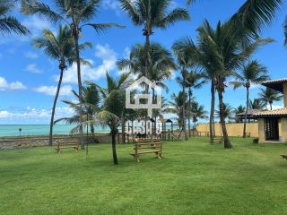 Apartamento duplex nascente com 3 suítes pé na areia e mobiliado a venda em Itacimirim Bahia