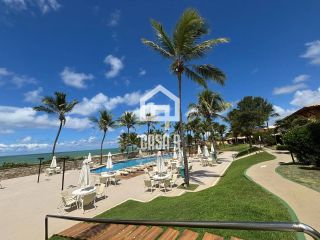 Apartamento duplex nascente com 3 suítes pé na areia e mobiliado a venda em Itacimirim Bahia