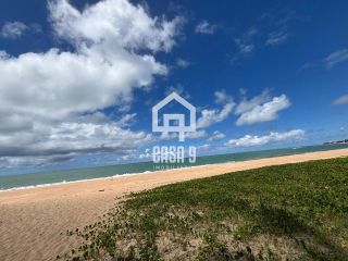 Apartamento duplex nascente com 3 suítes pé na areia e mobiliado a venda em Itacimirim Bahia