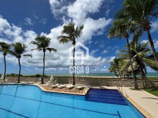 Apartamento duplex nascente com 3 suítes pé na areia e mobiliado a venda em Itacimirim Bahia