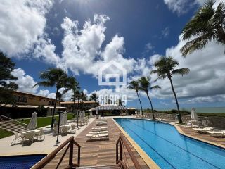 Apartamento duplex nascente com 3 suítes pé na areia e mobiliado a venda em Itacimirim Bahia