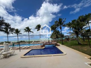 Apartamento duplex nascente com 3 suítes pé na areia e mobiliado a venda em Itacimirim Bahia