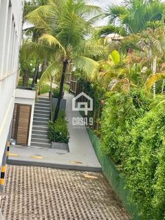 Apartamento térreo mobiliado com 3 quartos no condomínio Itacimirim Exclusive em Itacimirim Bahia