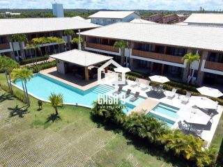 Apartamento superior mobiliado a venda com 2 suítes e varanda na Praia da Espera em Itacimirim Bahia