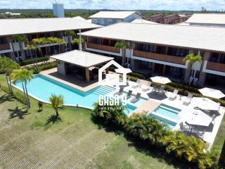 Apartamento superior mobiliado a venda com 2 suítes e varanda na Praia da Espera em Itacimirim Bahia