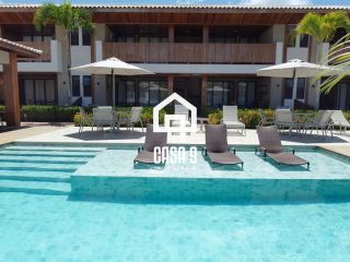 Apartamento superior mobiliado a venda com 2 suítes e varanda na Praia da Espera em Itacimirim Bahia