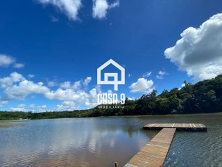 Casa com 2 suítes mobiliada a venda na beira da lagoa no Condomínio Reserva Aruá Lagoa Aruá Bahia