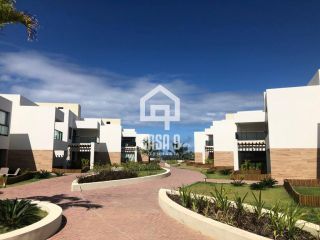 Apartamento mobiliado com 3 quartos pé na areia à venda em Itacimirim Bahia