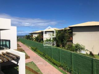 Apartamento mobiliado com 3 quartos pé na areia à venda em Itacimirim Bahia