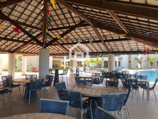 Apartamento mobiliado com 3 quartos pé na areia à venda em Itacimirim Bahia